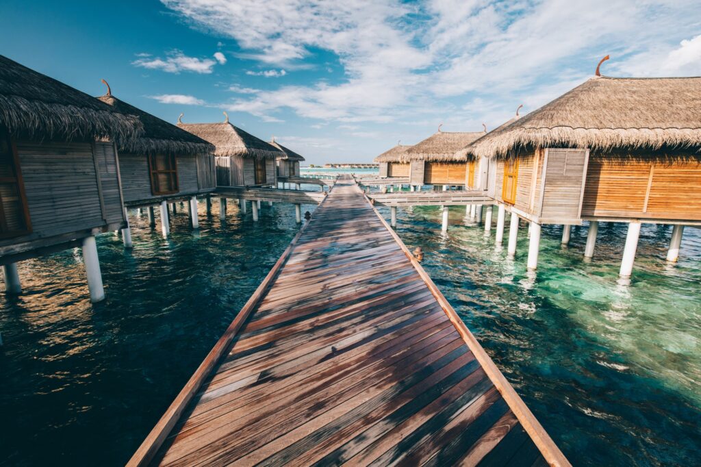 Jetty leading to water villas. Maldives